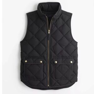 Very good used condition.J. Crew excursion quilted down vest. Black xs. Puffer.